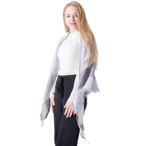 Classic oversized check scarf with fringe in grey and black cashmere-like knit fabric