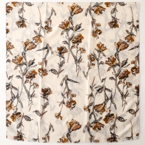 Detail of floral print on cream cotton-linen scarf with vintage frayed edge finish