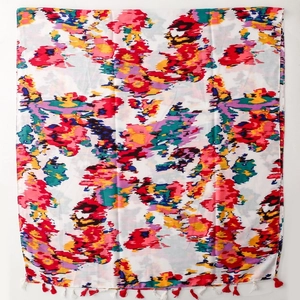 Artistic graffiti print scarf with colorful tassel details and retro shawl design