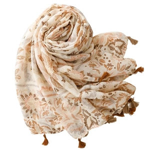 Bohemian floral scarf with retro leaf print and tassels on a light beige background