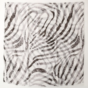 Detail view of the zebra print satin scarf featuring soft semi-transparent fabric texture