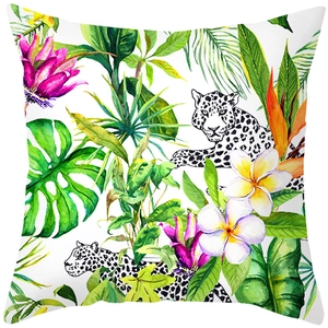 Tropical rainforest pillow case featuring leopard, monstera leaf, and floral print