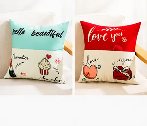 Detail of couple pillowcases with light blue and red color-blocking and holiday prints