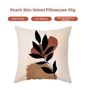 Close-up of peach skin pillowcase showing modern abstract leaf prints and soft texture