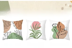 Detail of Morandi-style cushion covers featuring botanical line art and abstract floral patterns