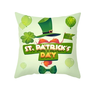 Detail of St. Patrick's Day pillowcase with green top hat and orange beard print