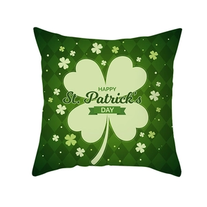 Detail of St. Patrick's Day pillow case showing green clover and diamond pattern