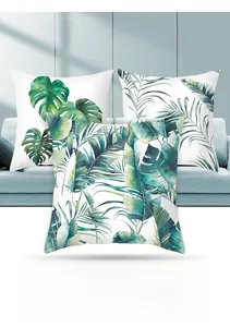Detail of soft peach skin pillowcase with vibrant tropical green leaf digital printing