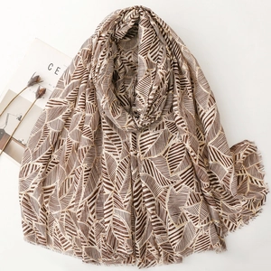 Elegant thin scarf with leaf patterns and tassels for women travel styling and warmth