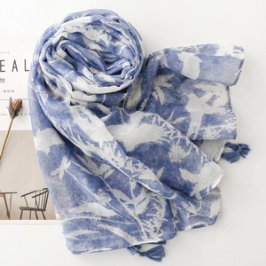 Vintage floral printed shawl with blue tassels and boho pattern on white background