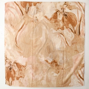 Detail shot of sheer satin scarf with abstract floral print and gold foil accents