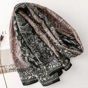 Detailed paisley and floral print pattern on a soft long pashmina scarf wrap