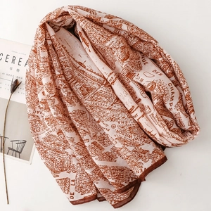 Close-up of lightweight scarf with hand-painted map print and architectural details