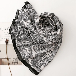 Detail of artistic black and white Paris map print on soft lightweight shawl fabric