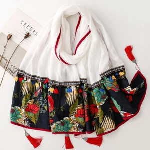 Ethnic embroidered shawl with lotus print and colorful tassels for travel outfit