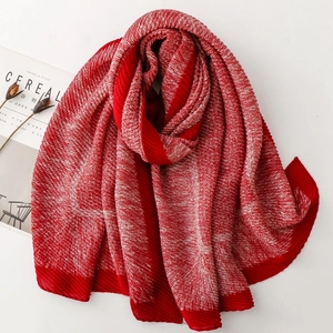 Red and white pleated knit scarf with a textured pattern for a cozy autumn winter look
