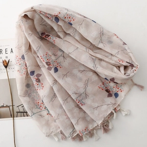 Lightweight floral scarf with berry patterns and tassels on an elegant white background