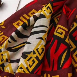 Detail of diamond zebra pattern scarf showing soft cotton linen texture and ethnic colors