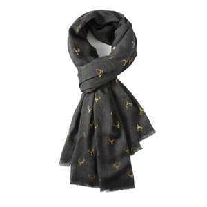 Dark grey cotton linen scarf with gold reindeer print and tassel edges for winter