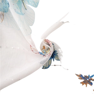 Lightweight white butterfly print scarf with silver sequins and translucent fabric texture