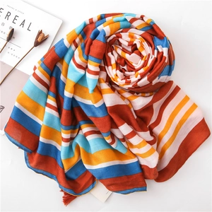 Colorful striped cotton scarf for women with elegant red tassels for summer beach travel