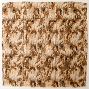 Close-up of marble texture gradient shawl with metallic foil dots and fringed edges