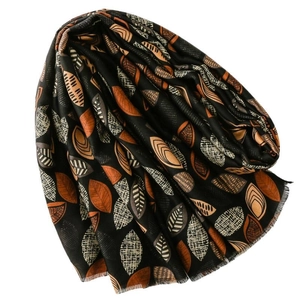 Fashion cotton linen feel scarf with autumn leaf print and frayed edges on black base