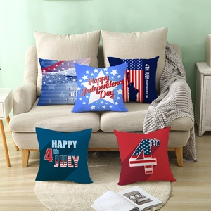 Five-piece set of US Independence Day throw pillow covers on a white sofa and rug