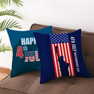 Set of two US Independence Day peach skin pillow covers on a cozy sofa for home decor