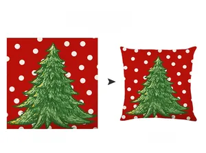 Detail of red Christmas pillowcase with white dots and green tree festive print