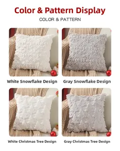 Detailed view of white and gray plush Christmas pillow covers with 3D embroidery texture