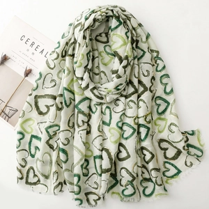 Elegant ivory linen scarf with golden heart prints and soft fringe edges for women