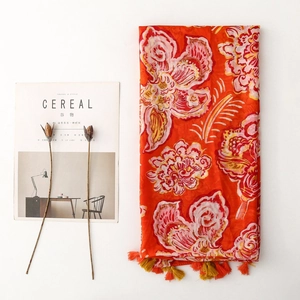 Ethnic orange floral shawl with tassels and bohemian flower print for women