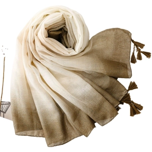 Elegant gradient linen-feel scarf with shimmering silver threads and fringe details