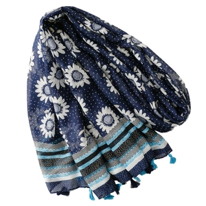 Ethnic navy blue scarf with white sunflower pattern and bohemian tassel fringe detail