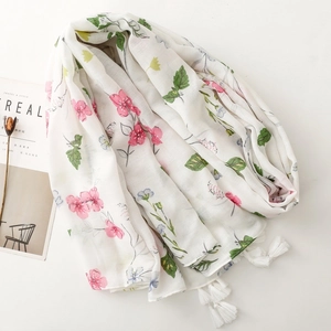 White herringbone floral scarf with pink flower prints and elegant fringe tassels