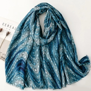 Blue and white bohemian mandala print scarf with tassels and elegant fringe details