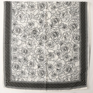Elegant black and white silk scarf with large rose floral patterns and polka dot edges