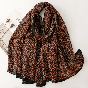 Sciarpa lunga da donna con motivo paisley in arancione e nero per viaggi e moda