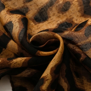 Lightweight leopard print chiffon scarf with semi-transparent texture and soft drapes