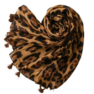 Lightweight leopard print scarf in heart shape with fringe trim on white background
