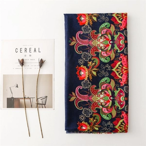 Navy blue ethnic paisley floral shawl with tassels on minimalist white background