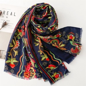 Ethnic style navy floral print scarf with fringed edges and vintage geometric patterns