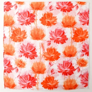 Floral cotton-linen feel scarf with herringbone weave and vibrant orange flower patterns