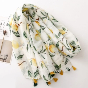 Summer lemon print bali yarn scarf with tassels on elegant white background decoration