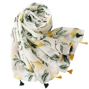 Lightweight Bali yarn scarf with yellow lemon print and vibrant green fringe tassels