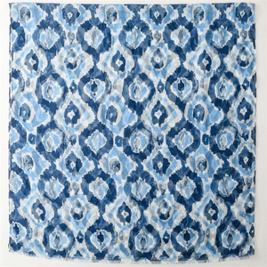 Blue geometric bali yarn scarf with ethnic tie-dye patterns and soft frayed edges
