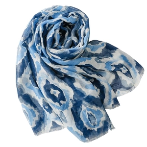 Blue geometric bali yarn scarf with artistic ink patterns and soft frayed edges for women