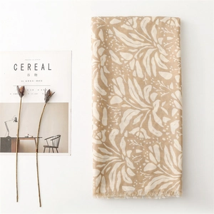 Elegant beige floral cotton linen scarf with abstract leaf prints and fringe edge