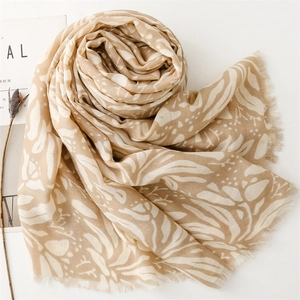 Linen feel khaki floral scarf for women with elegant botanical leaf patterns and tassels